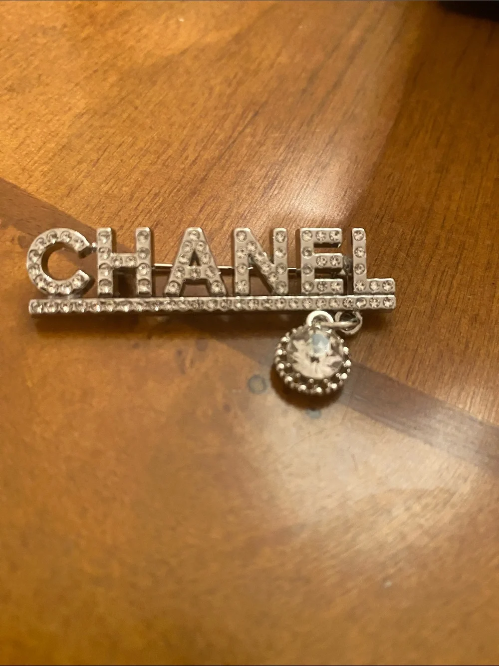 Fashion Jewelry Silver-Tone CHANEL Logo Brooch with Crystal Drop